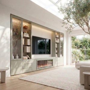 Mueble de salón con chimenea en verde menta y coco de Luca Atelier